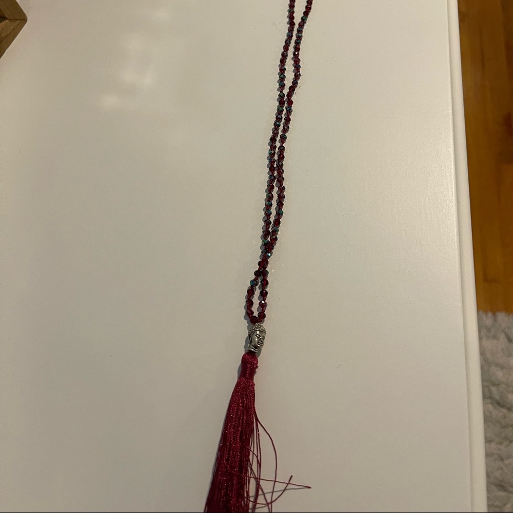 Long tassle Buddha necklace